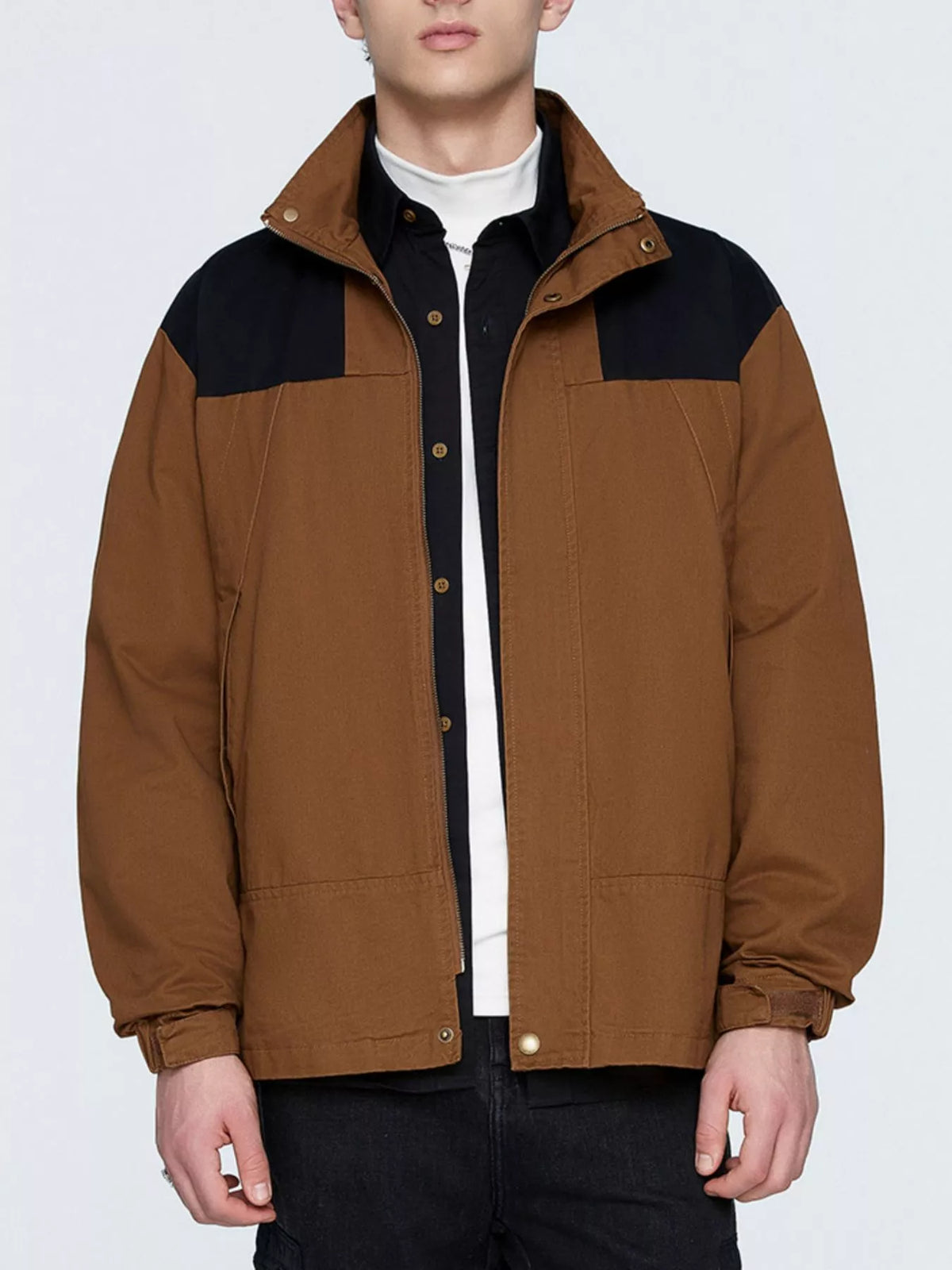 Brown two-tone men's jacket shown open from the front; layered shirts and trousers are not included.