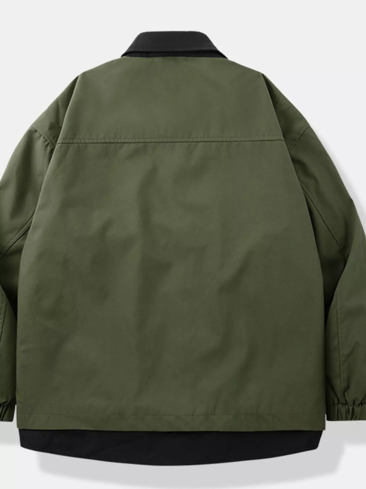 Olive jacket with black contrast panels, back view.