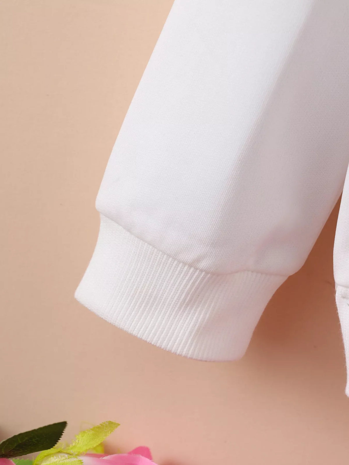 Close-up of the hoodie sleeve and ribbed cuff