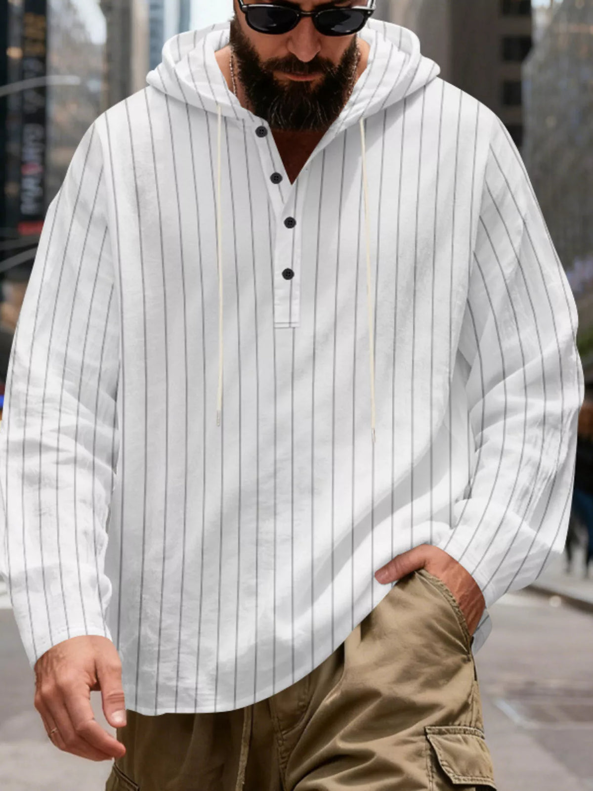 Men's striped Henley hoodie in White — front view showing the hood and buttoned neckline; trousers and accessories are styling only.
