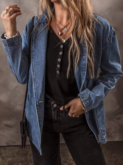 Front view of the one-button denim blazer worn open; top, trousers and accessories not included