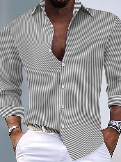 Dark gray men's striped button-up long-sleeve shirt shown on a model. Shirt only; trousers, belt, watch and jewelry are not included.
