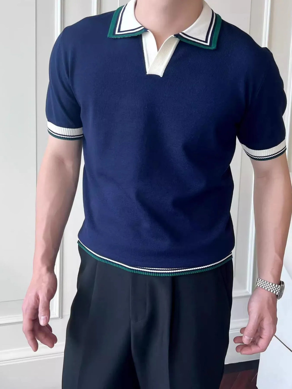 Royal Blue polo with striped collar, placket and ribbed hem, front view. Shirt only.