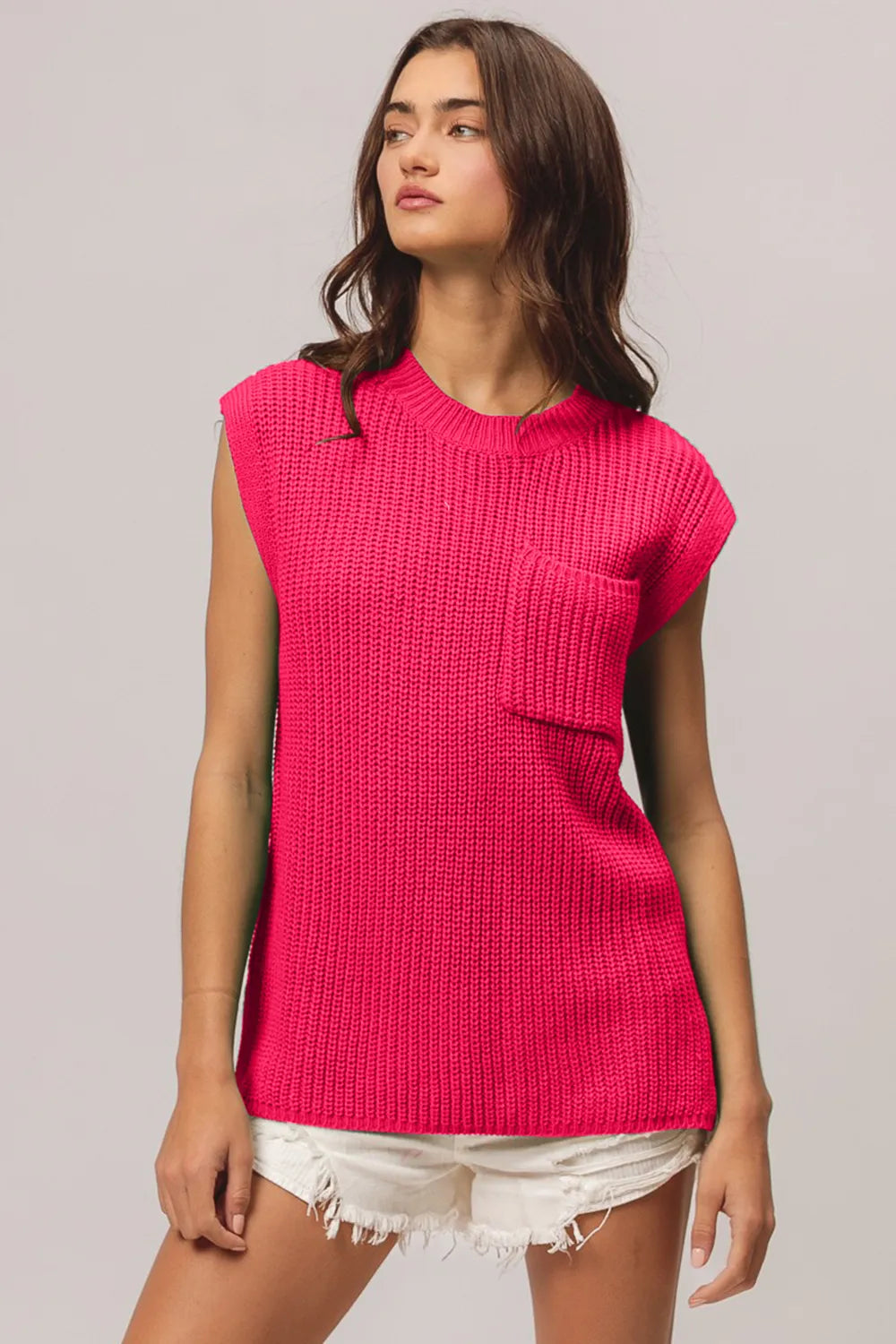 Fuchsia round-neck cap-sleeve knit top with chest patch pocket, shown from the front; only the top is sold.