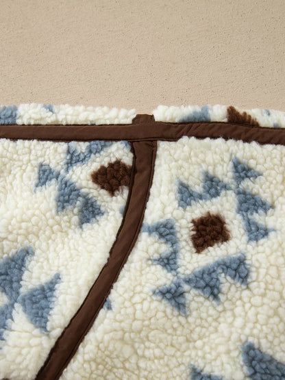 Detail of brown seam trim on the sherpa sweatshirt.