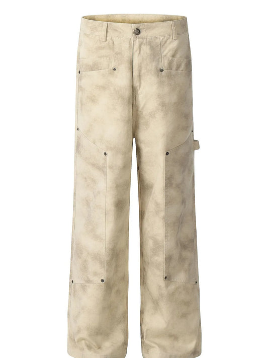 Front view of men's pale mottled loose-fit trousers with pockets and belt loops