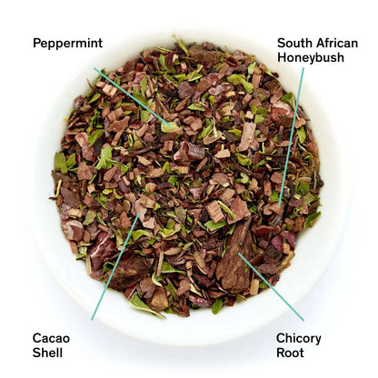 Love Story loose herbal tea blend annotated with peppermint, honeybush, cacao shell, and chicory root