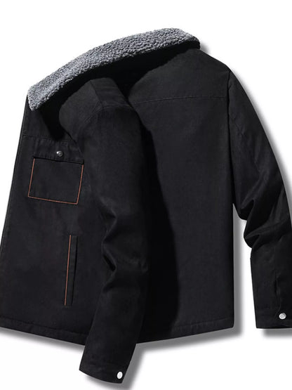 Angled view of the Black long-sleeve zip-up utility jacket.