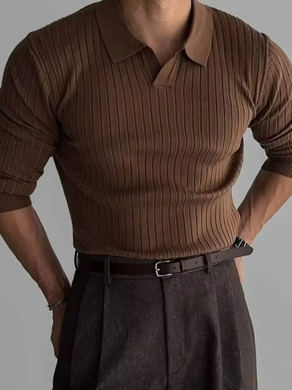Brown polo worn with sleeves rolled, front view; polo shirt only.