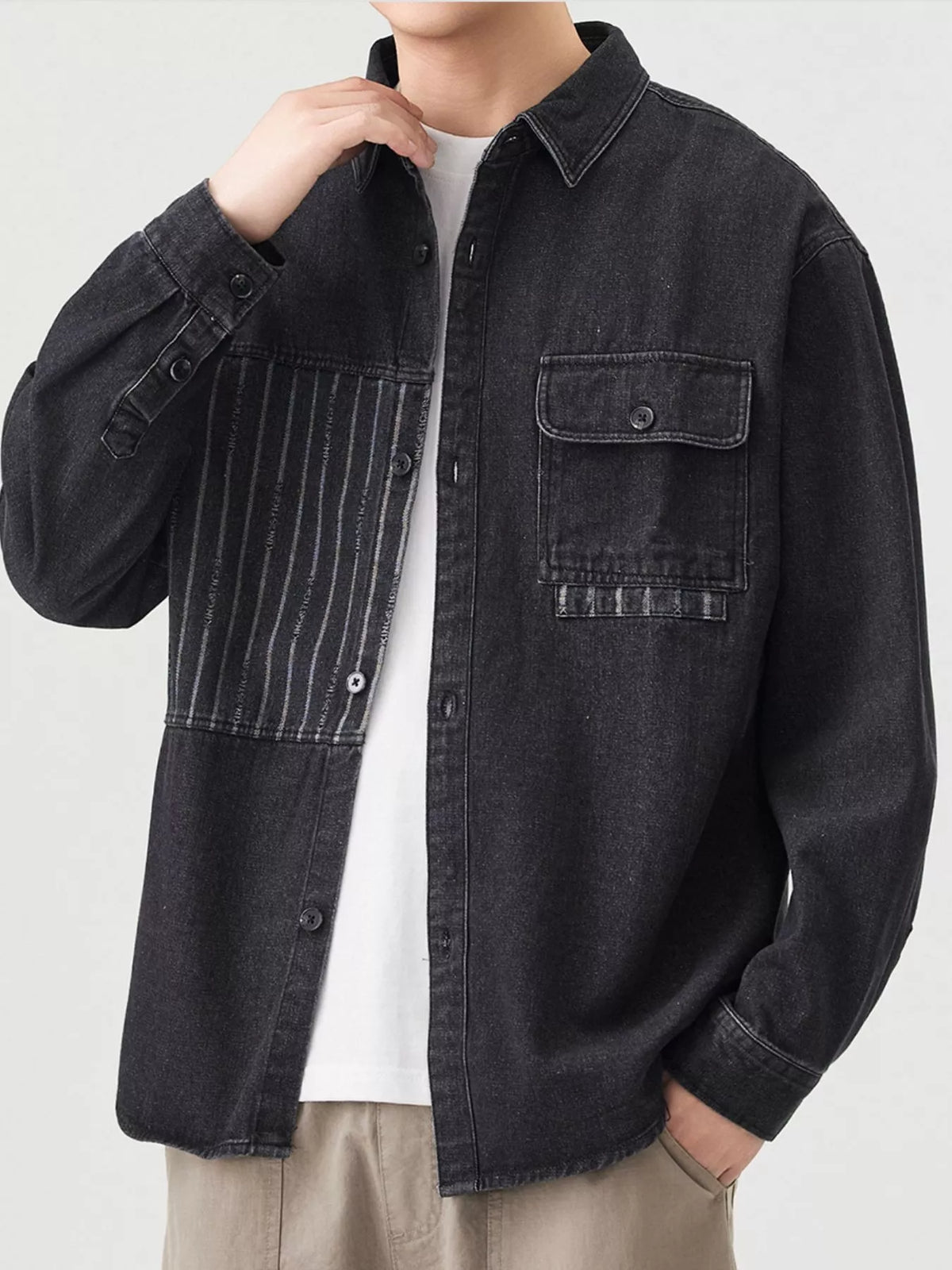 Black men's button-up denim shirt, front detail