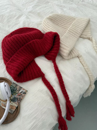 Red and Off-white beanies shown together; one selected-colour hat included