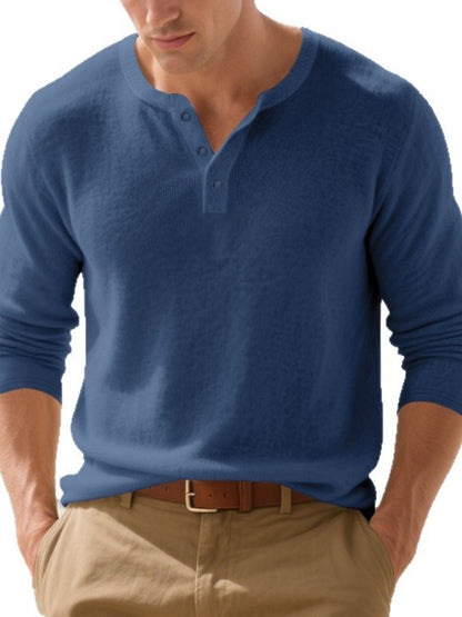 Denim blue cotton-rich long-sleeve Henley shirt with a button neckline, shown from the front.