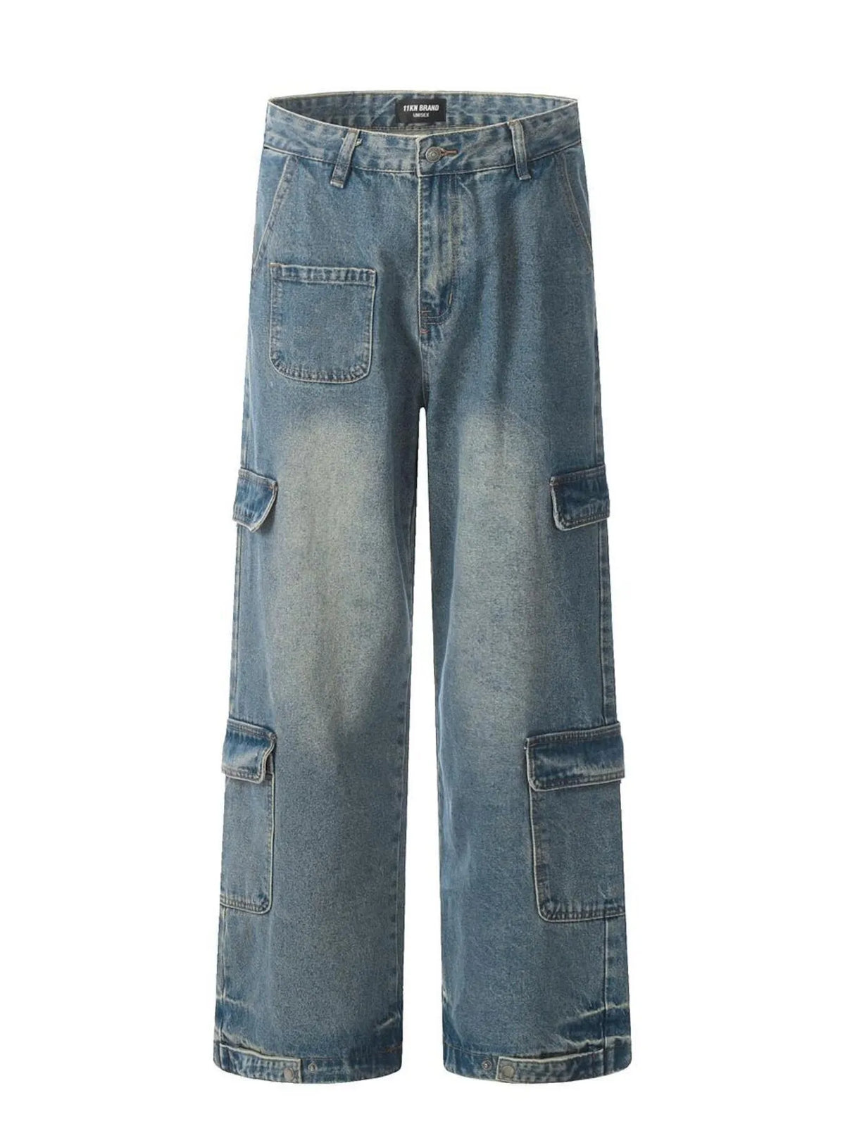 Garment-only front view of washed blue cargo jeans with multiple flap pockets and wide legs.