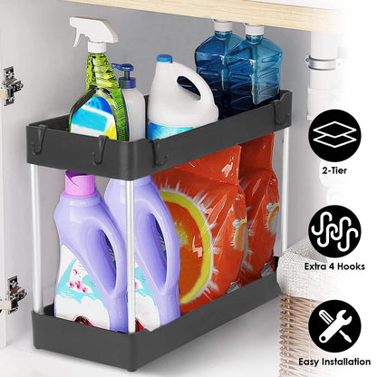One black two-tier organizer under a sink with cleaning supplies; contents, cabinet and sink are excluded.