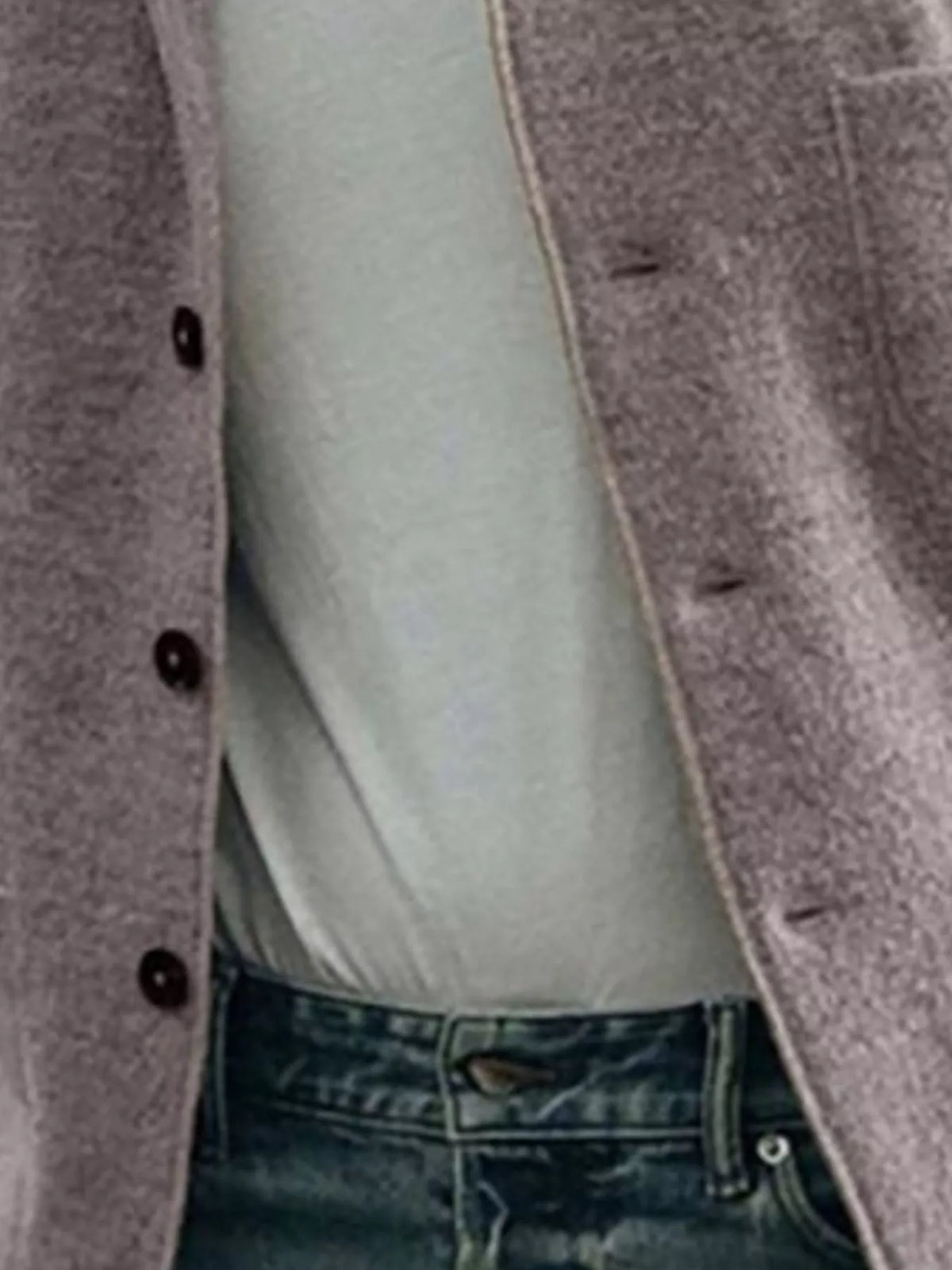 Close-up of the Mocha jacket's textured fabric, front buttons and buttonholes; T-shirt and jeans are not included.