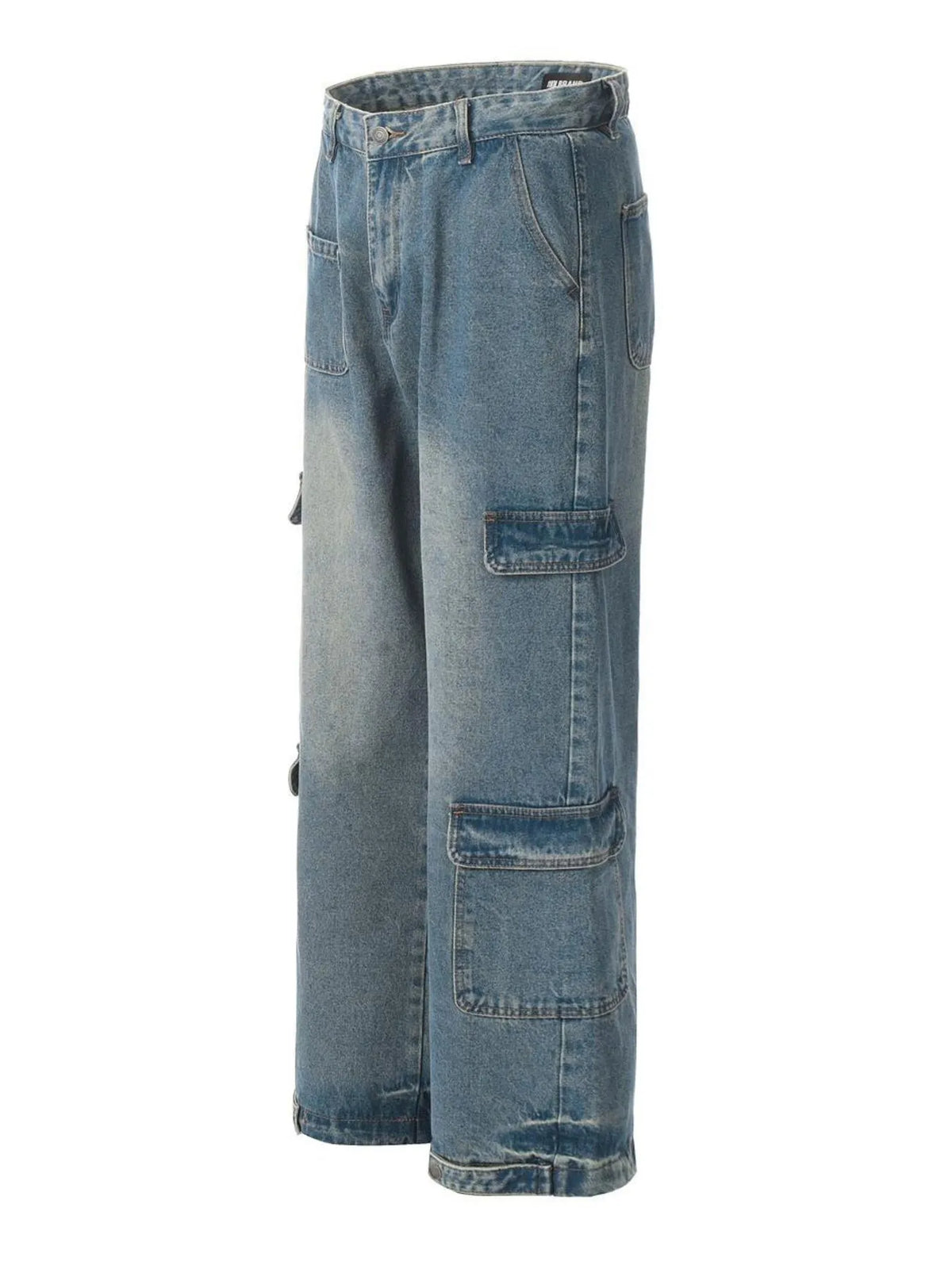 Angled garment-only view of blue cargo jeans showing side flap pockets and a wide-leg silhouette.