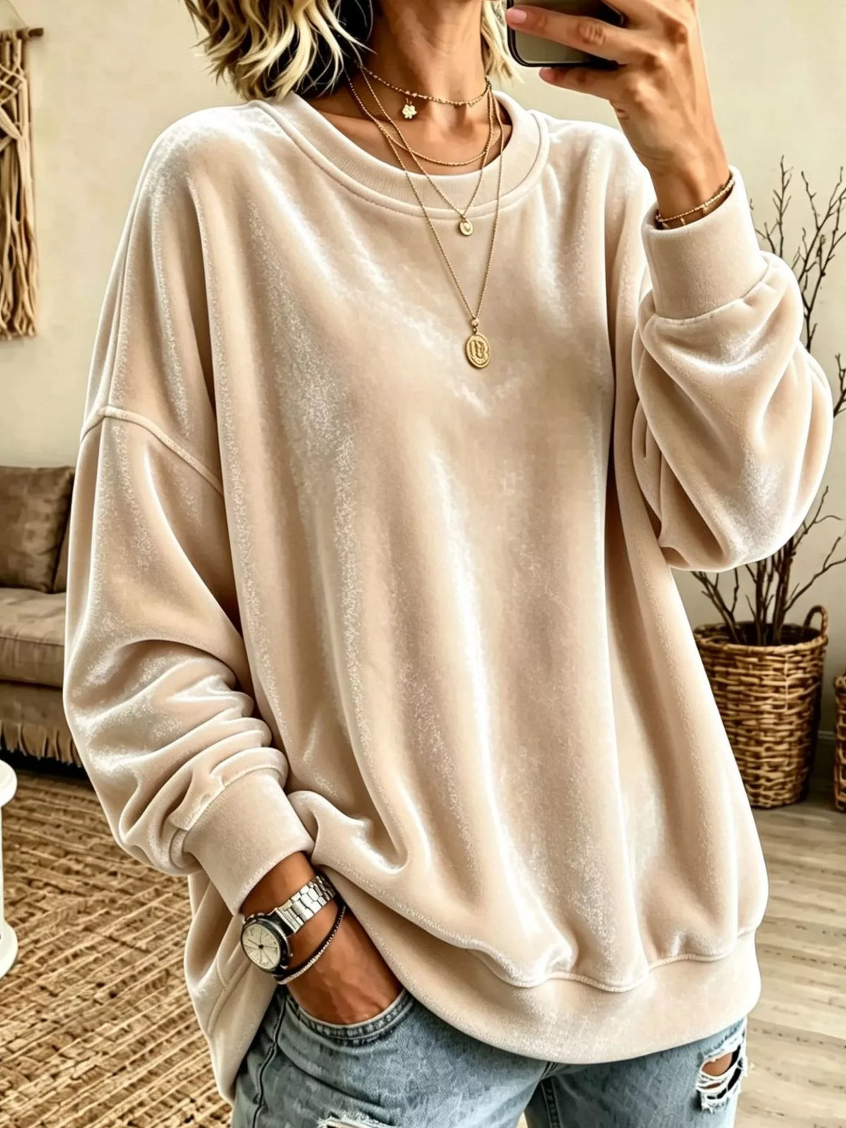 Velvet crewneck sweatshirt — Apricot front view. One sweatshirt only; jewellery and jeans are styling items, not included.