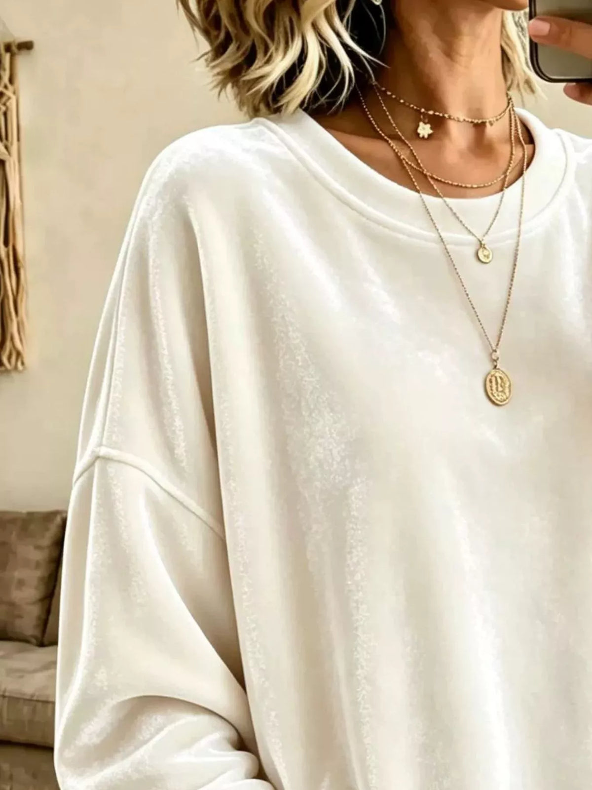 Velvet crewneck sweatshirt — White neckline and fabric detail. One sweatshirt only; jewellery and jeans are styling items, not included.