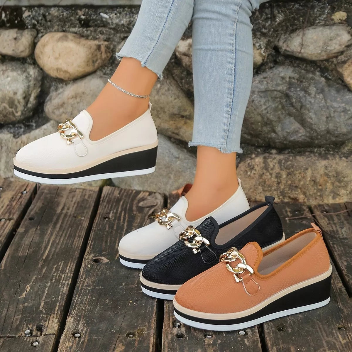 Beige round-toe wedge loafers worn with black and brown colour options displayed alongside; only one selected pair is sold.