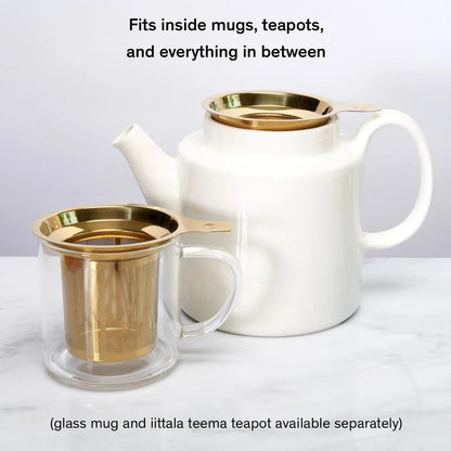 Gold Stainless tea infuser shown in a mug