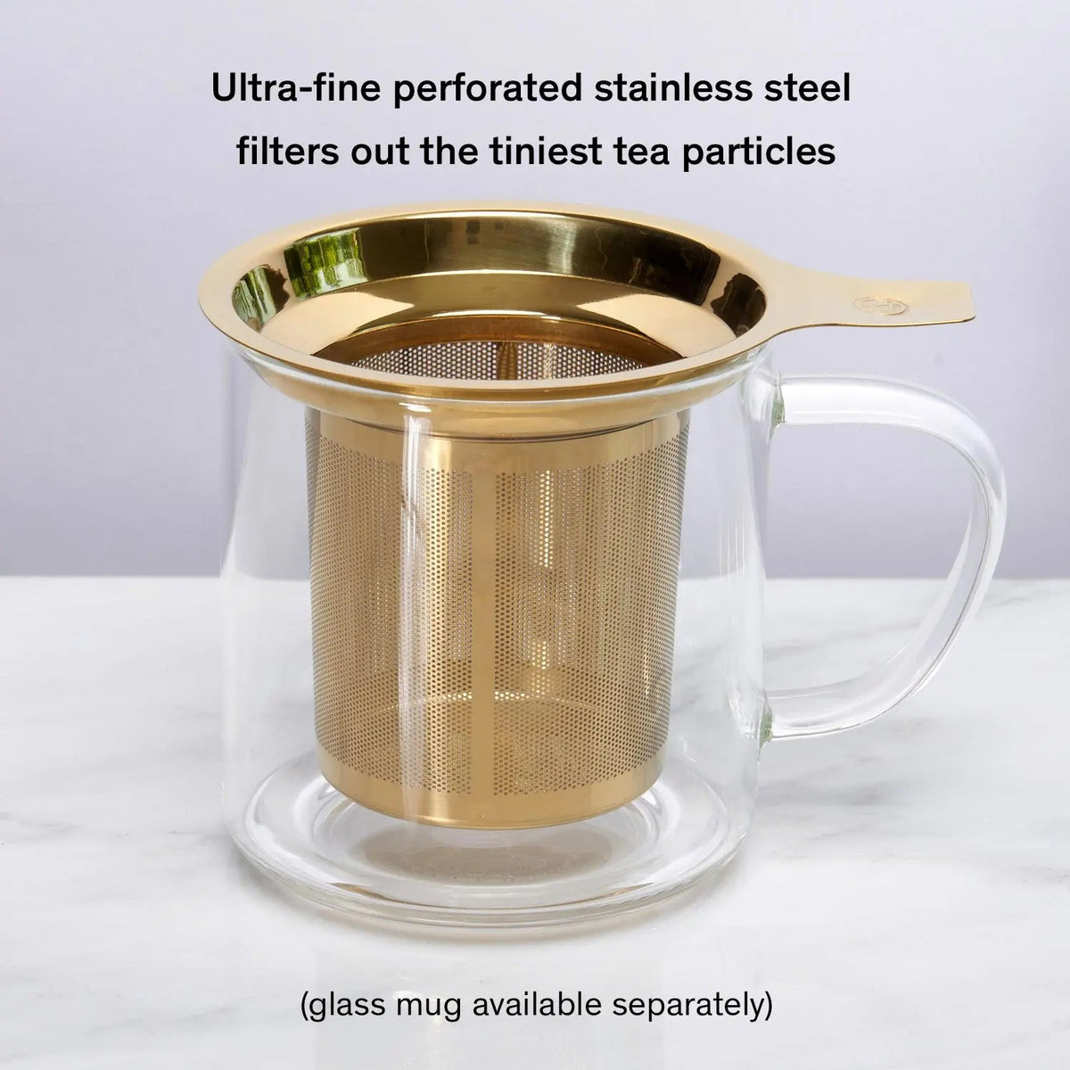 Gold Stainless tea infuser shown in a mug