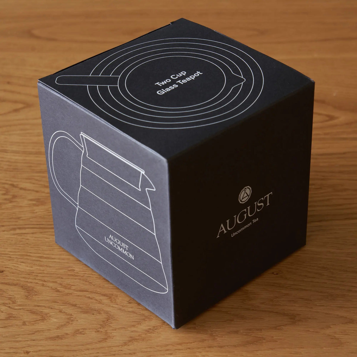 August Two Cup Glass Teapot packaging, top and side