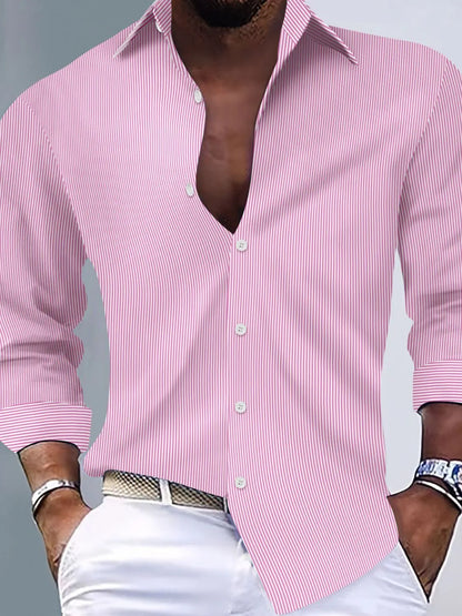 Pink men's striped button-up long-sleeve shirt shown on a model. Shirt only; trousers, belt, watch and jewelry are not included.
