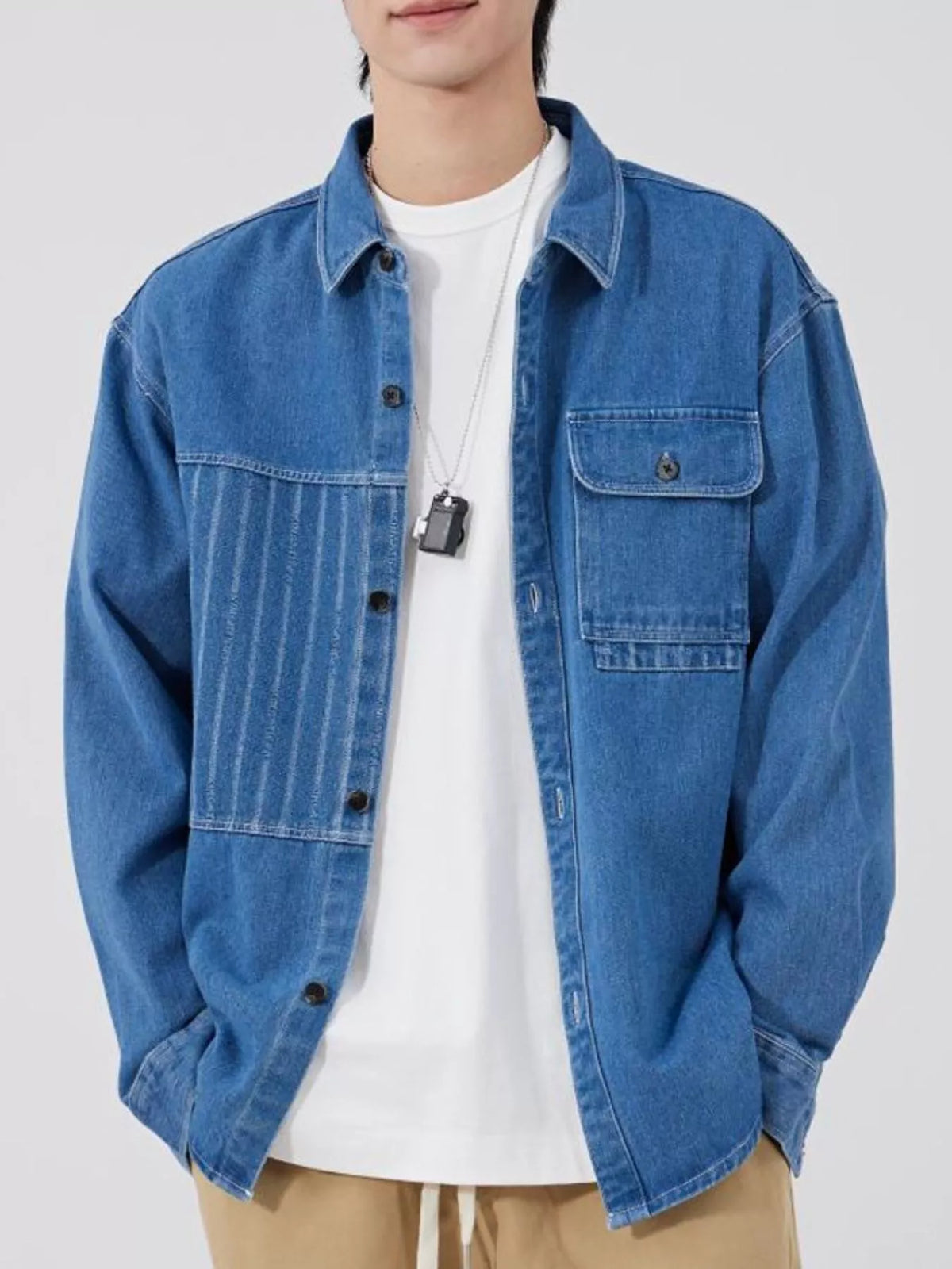 Light Blue men's button-up denim shirt, front view, styled over a white T-shirt