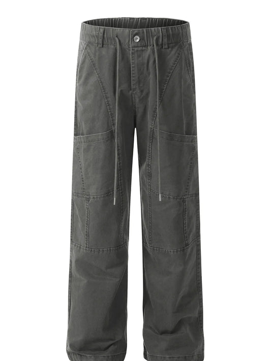 Garment-only front view of grey cotton cargo trousers with drawstrings, front pockets and knee seams.