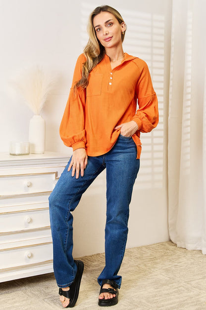 Orange side-slit hoodie, full styling view; jeans and shoes not included