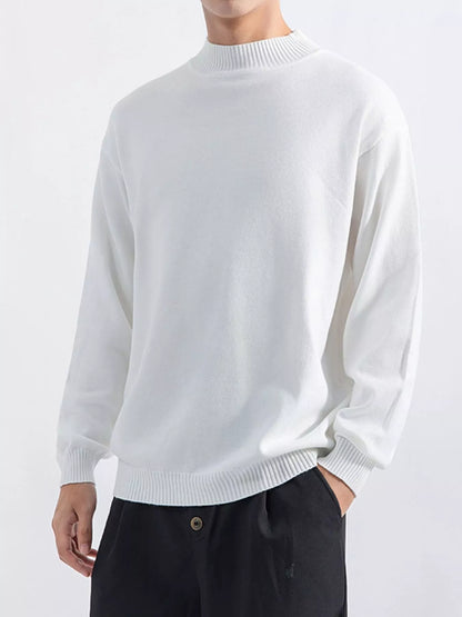 Men's White minimalist mock-neck sweater, front view. Trousers are styling items and are not included.