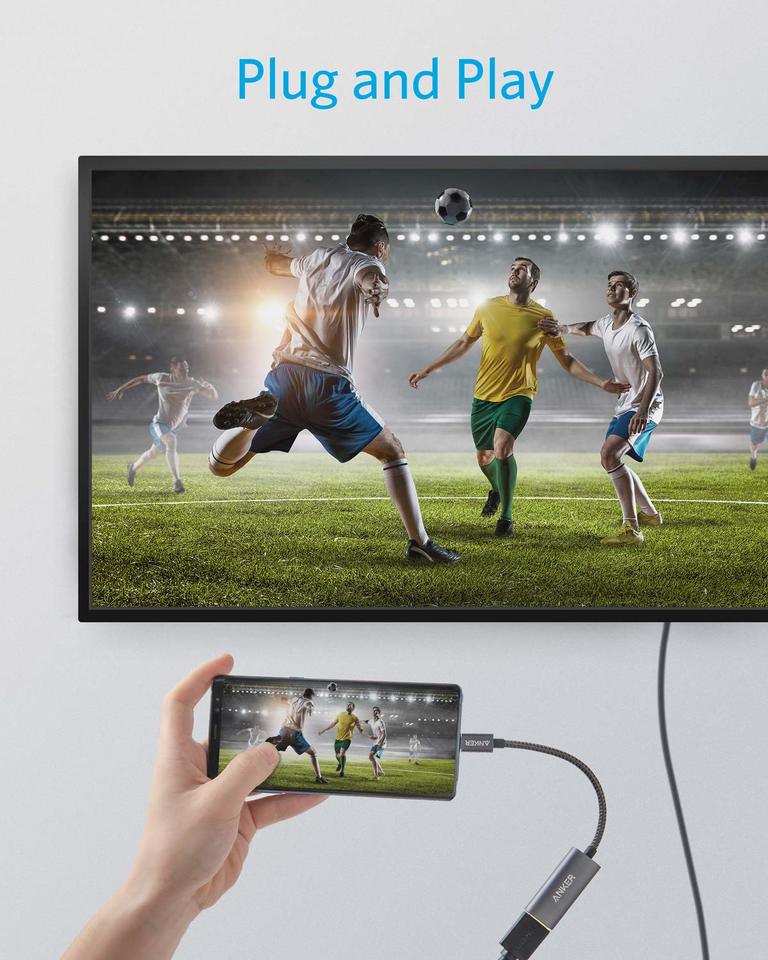 Anker USB-C to HDMI adapter connecting a compatible phone to a television; phone, TV and HDMI cable not included.