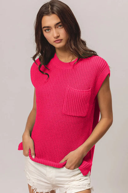 Front view of a fuchsia cap-sleeve knit top with a single chest patch pocket; white shorts are styling only and are not included.
