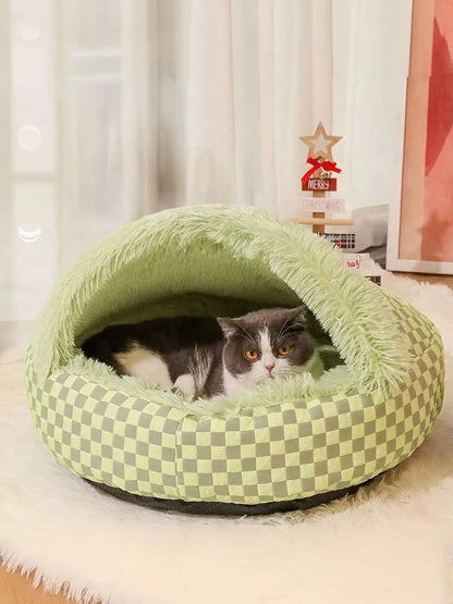 Green checkerboard covered pet nest with a cat resting inside; one nest sold separately.