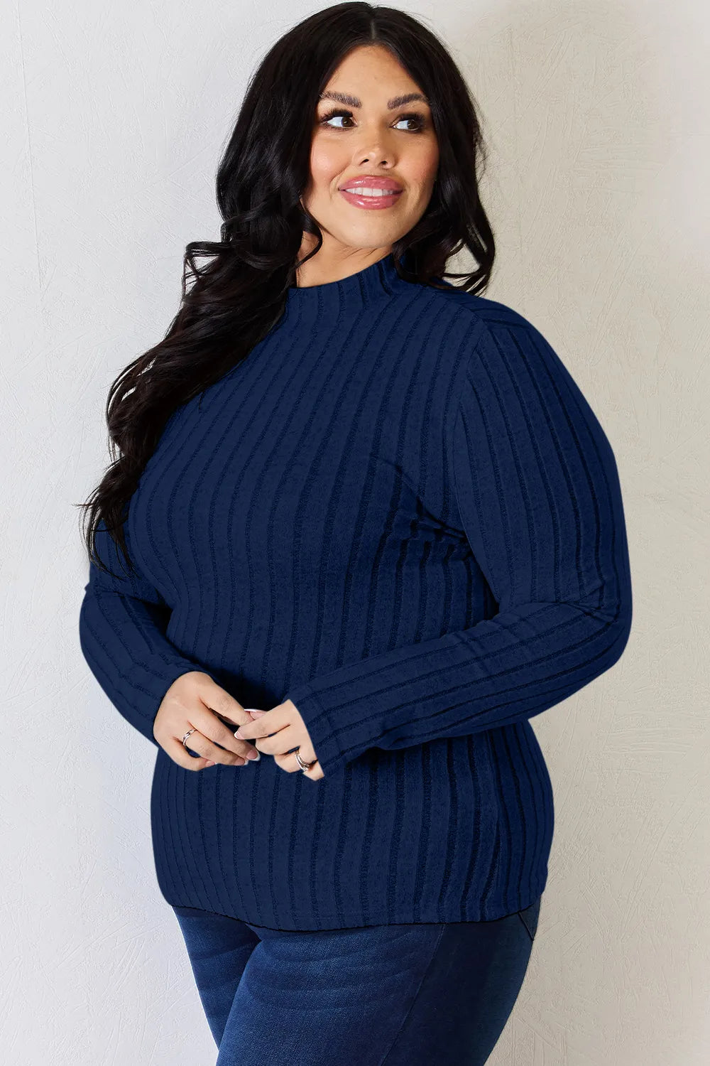 Dark Blue ribbed mock-neck long-sleeve top, product view; one top included, jeans and accessories excluded