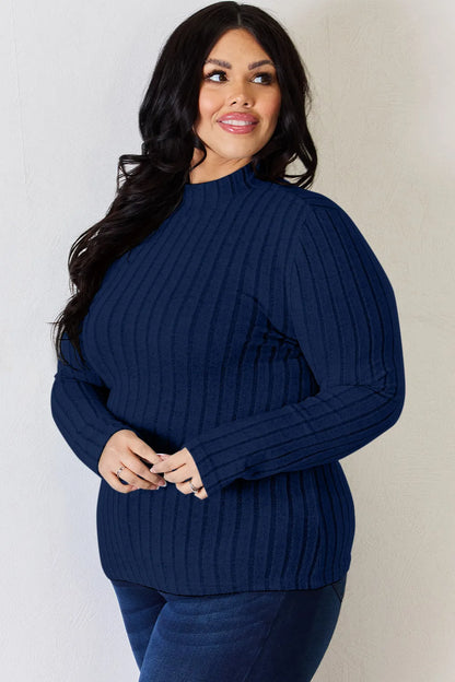 Dark Blue ribbed mock-neck long-sleeve top, product view; one top included, jeans and accessories excluded