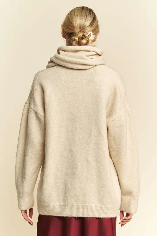 Back view of the cream Davi & Dani dropped-shoulder sweater with the matching scarf around the neck.