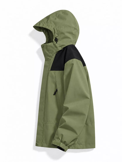 Green windbreaker with black shoulder panels, side view.