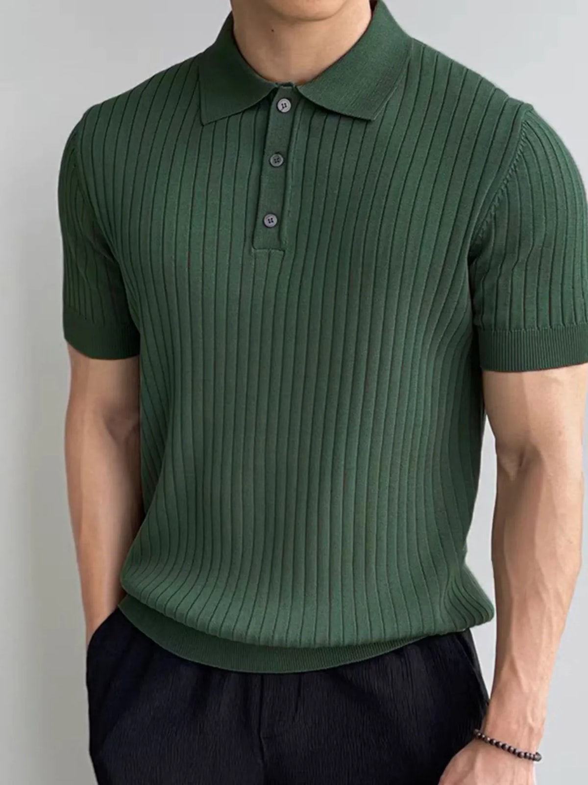 Men's Green ribbed knit polo worn, front view; polo only