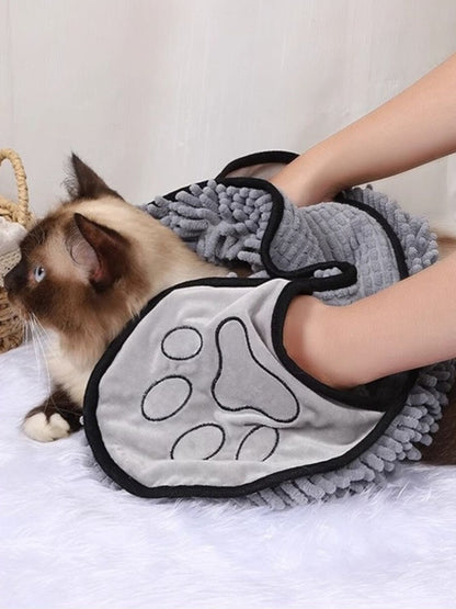 Gray paw-print pet towel demonstrated drying a cat; one towel