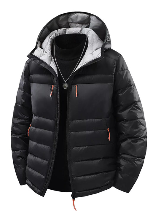 Black hooded puffer jacket shown from the front with contrast gray lining and orange zipper pulls; black top and necklace are not included.
