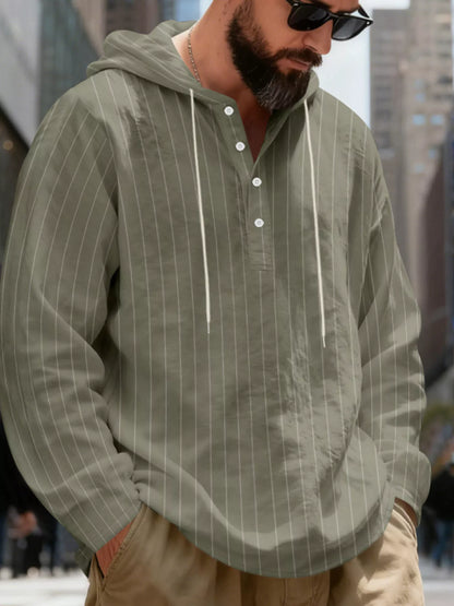Men's striped Henley hoodie in Army Green — neckline and upper front view showing the hood and buttoned neckline; trousers and accessories are styling only.