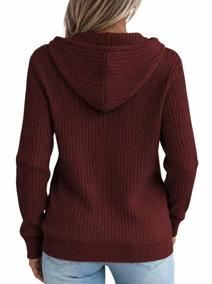 Back view of the burgundy ribbed zip-front hooded cardigan with long sleeves.