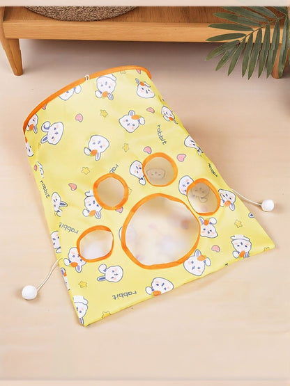 Yellow rabbit-print cat tunnel panel laid flat with round openings.