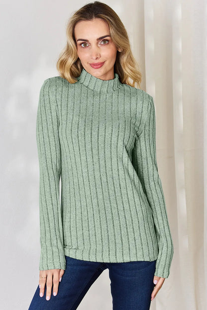 Light Green ribbed mock-neck long-sleeve top, product view; one top included, jeans and accessories excluded