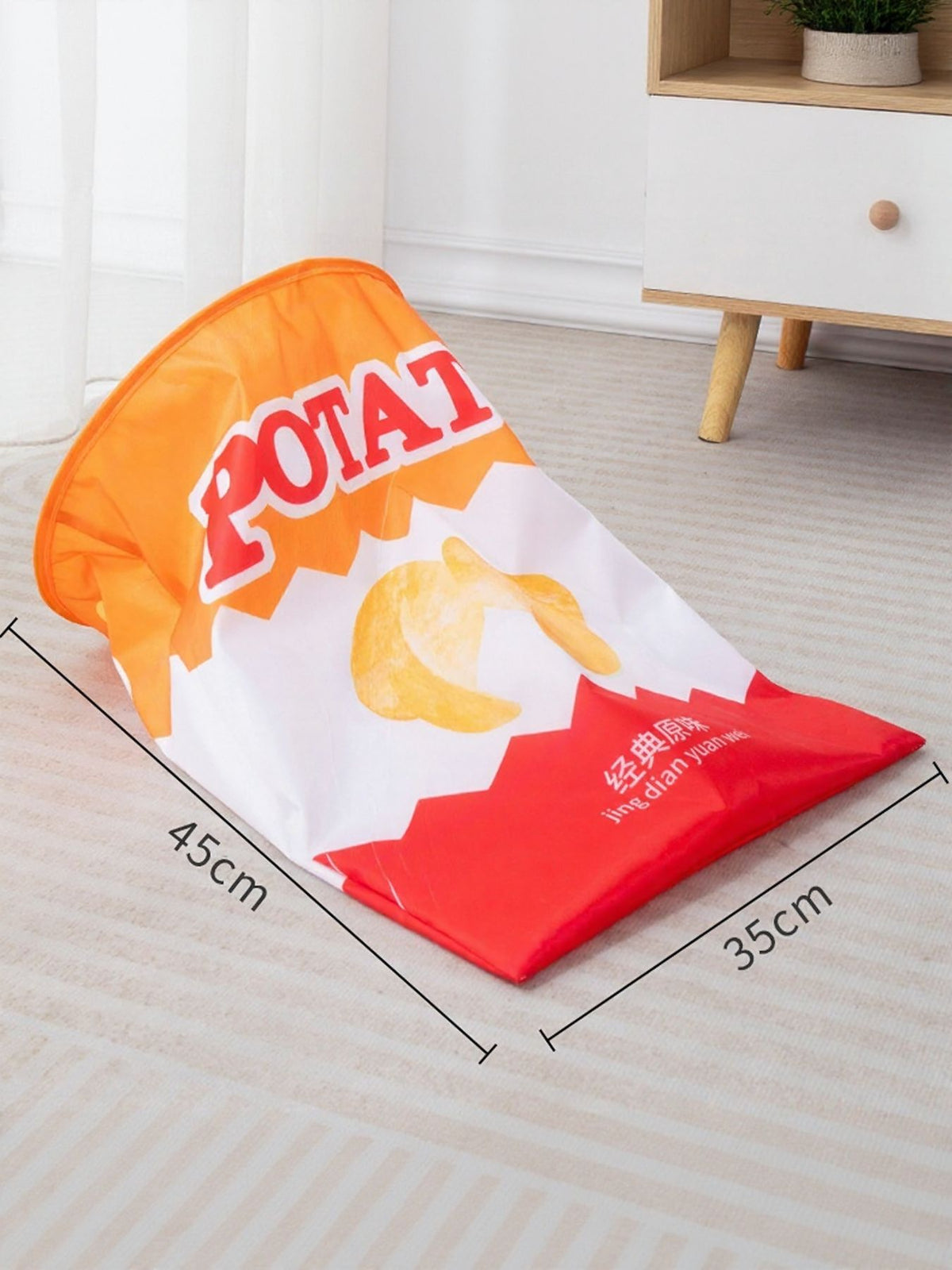 Orange snack-package-print cat tunnel with 45 by 35 centimeter dimensions.