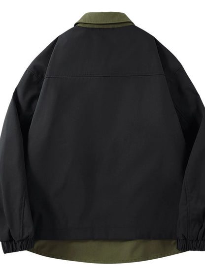 Black jacket, back view with horizontal upper-back seam.