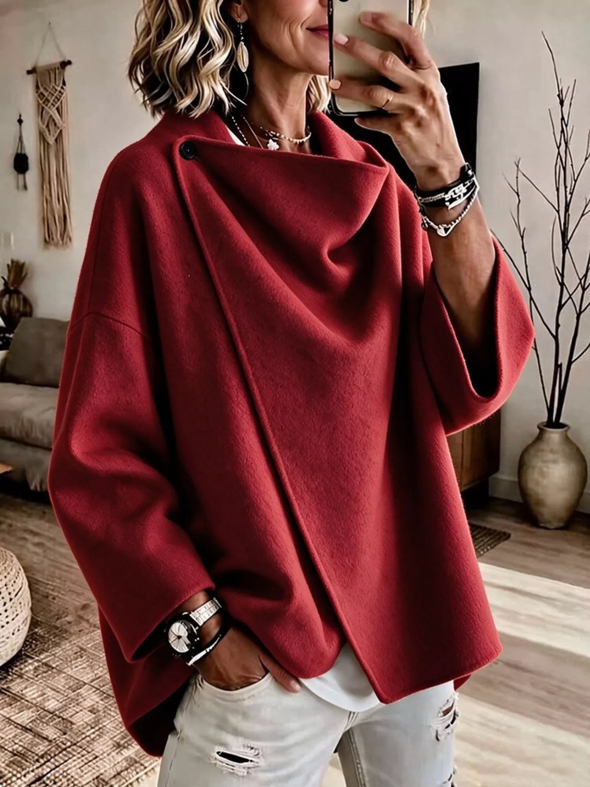 Red asymmetric cowl-neck cape, modeled front view; one cape included