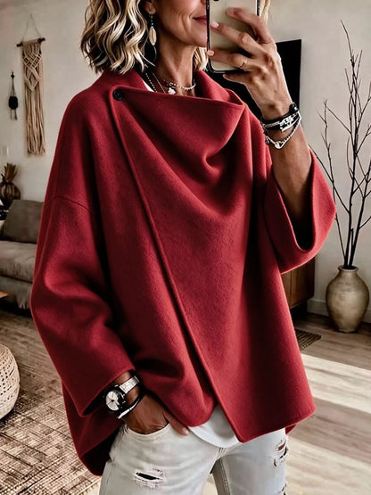 Red asymmetric cowl-neck cape, modeled front view; one cape included