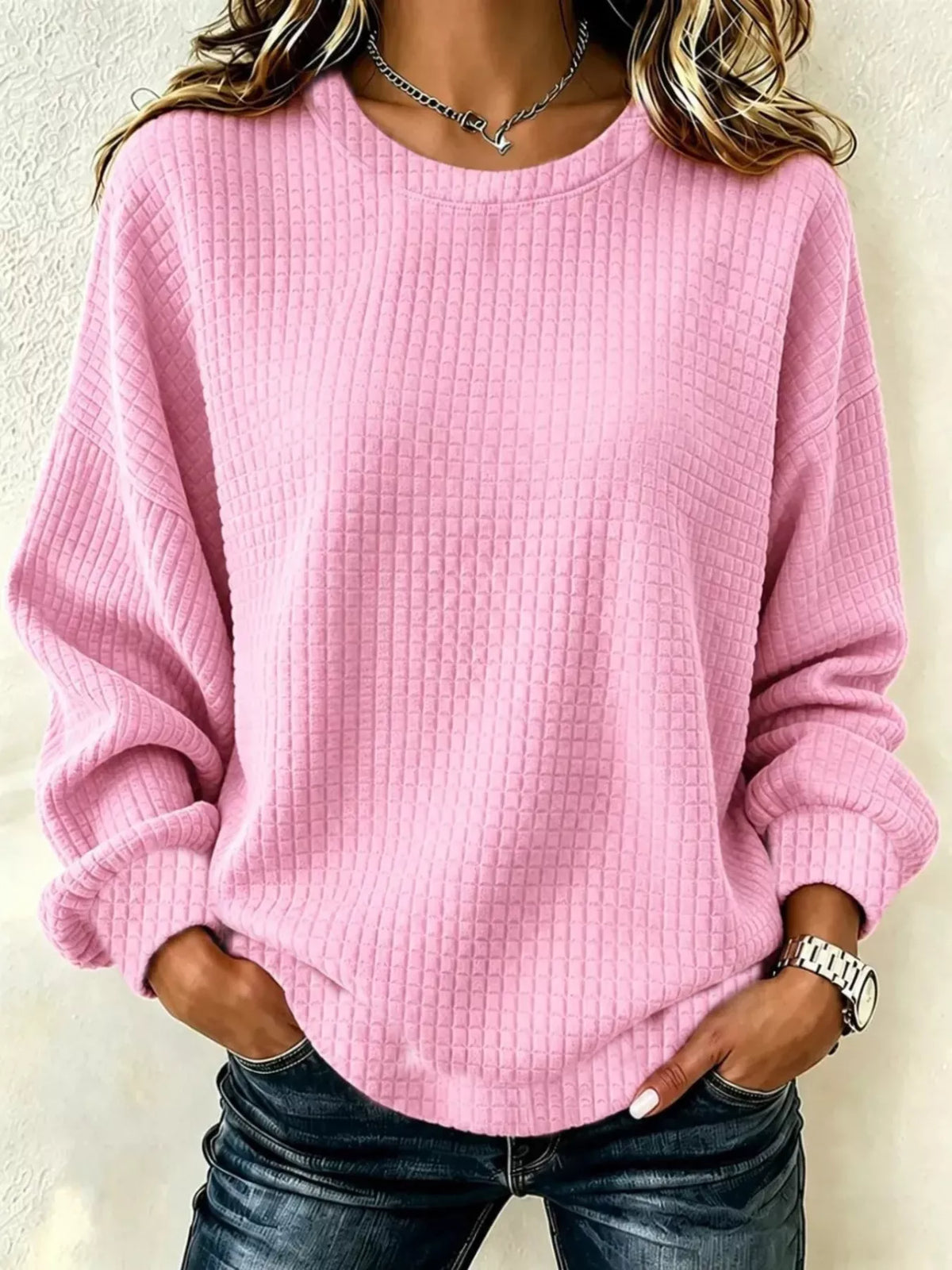 Front view of a Pink long-sleeve crew-neck waffle-knit sweatshirt. One top only.